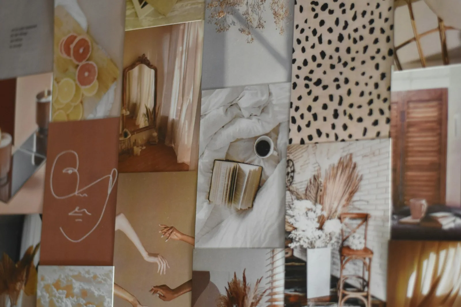 Cohesive aesthetic vision board collage in muted warm palette with magazine cuts, line-art face, and dried pampas