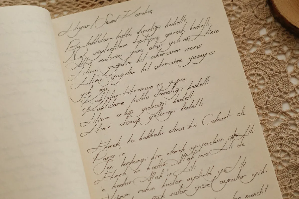 Handwritten first journal page resting on a crochet doily