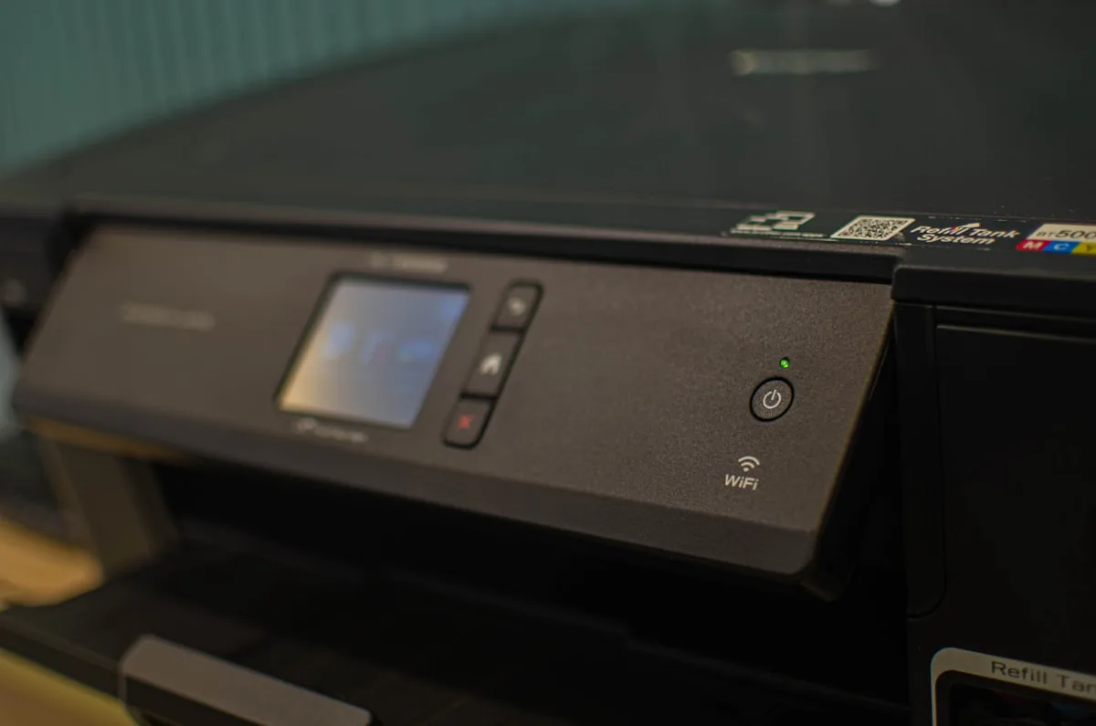 Home inkjet printer on a desk ready to print sticker sheets