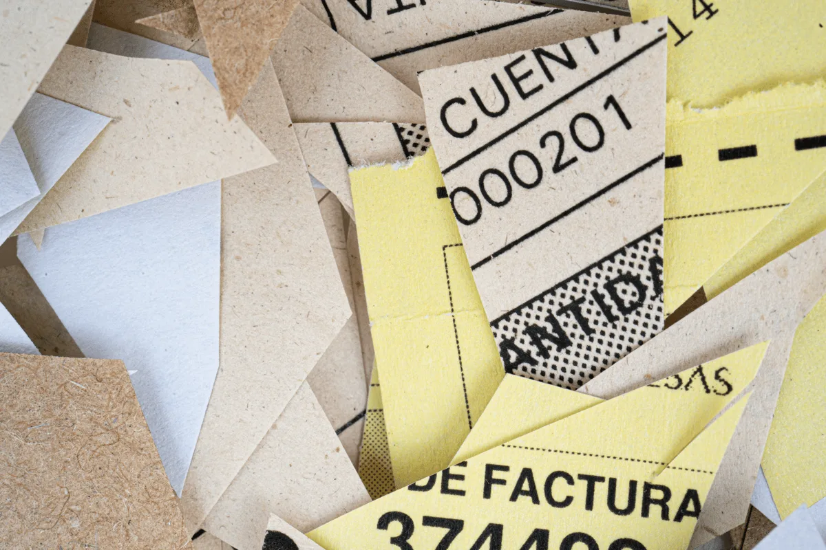 Close-up of torn vintage paper ephemera pieces