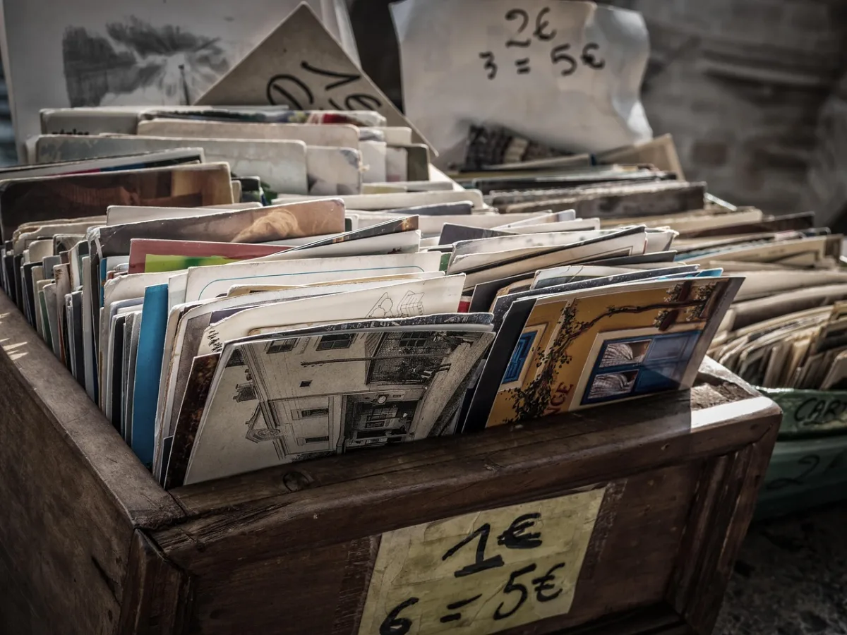 Box of vintage postcards and photographs found at a flea market