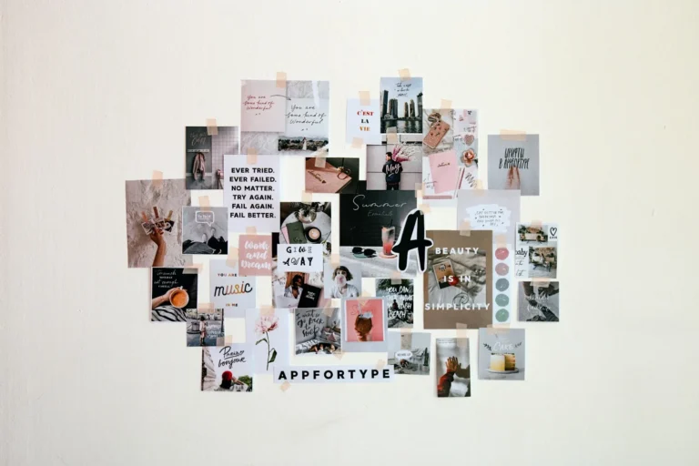 An aesthetic vision board mounted on a white wall with overlapping photo and quote cutouts arranged in an organic cluster