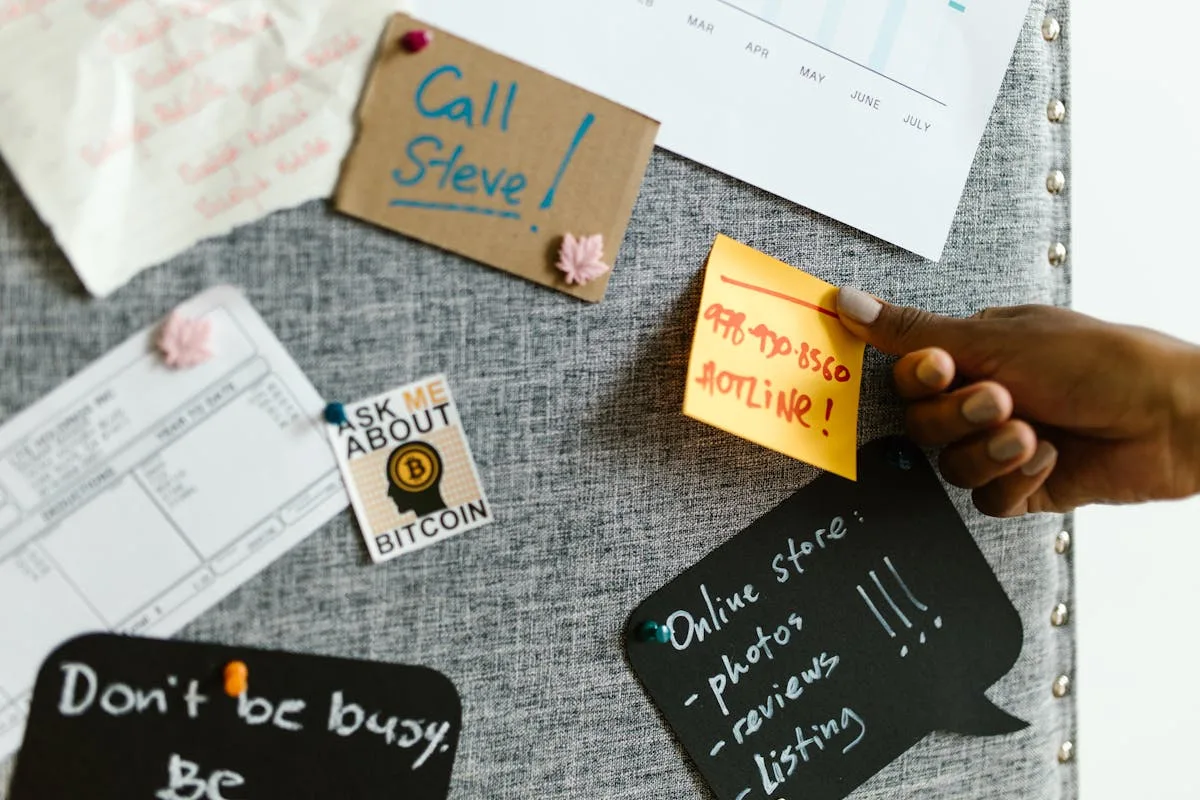 Inspirational quote pinned to a cork bulletin board in a home workspace