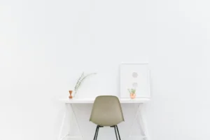 Aesthetic Canva Fonts: Soft, Dreamy Picks for a Curated Look Minimal white desk with a book, plant and chair in soft light