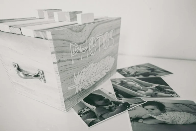 Baby first-year scrapbook with photos and keepsakes
