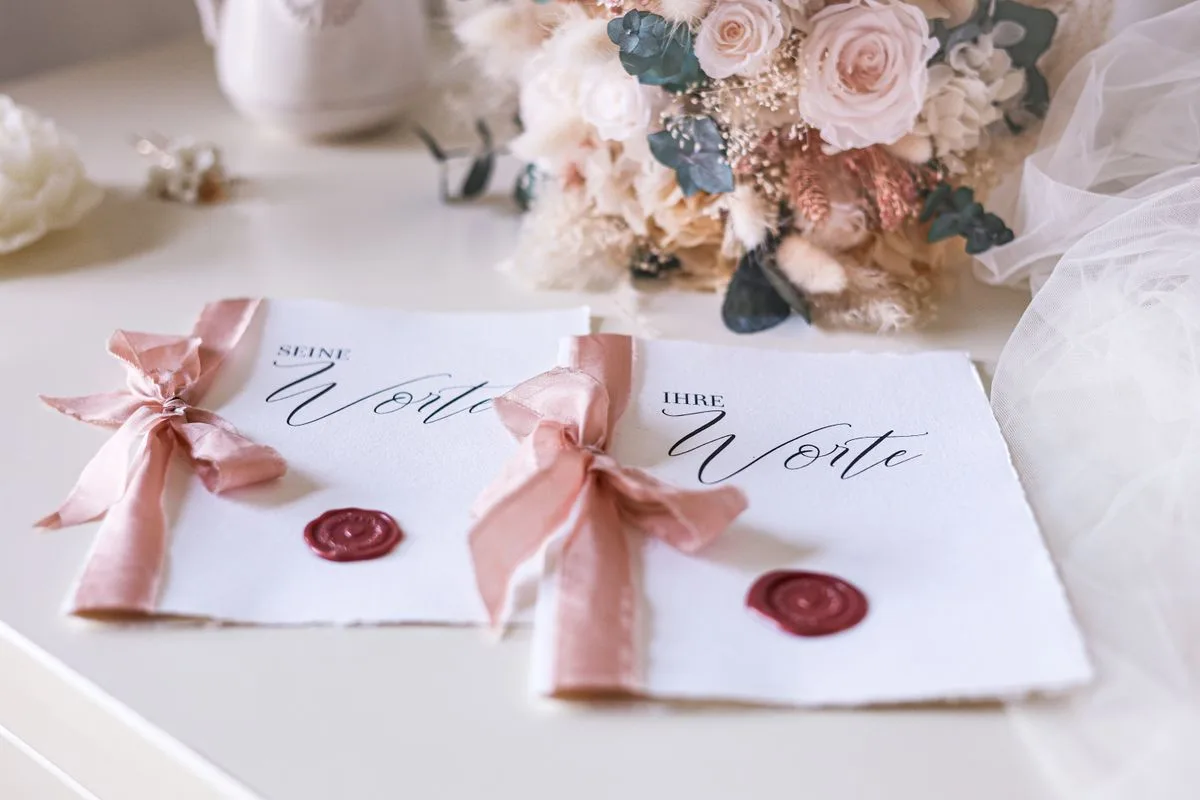 Elegant wedding invitation suite with calligraphy and floral styling