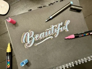 Cute Canva Fonts: Sweet, Playful Picks for Joyful Designs Colorful hand lettering of the word beautiful with colored pencils on kraft paper