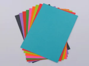 A stack of patterned scrapbook paper