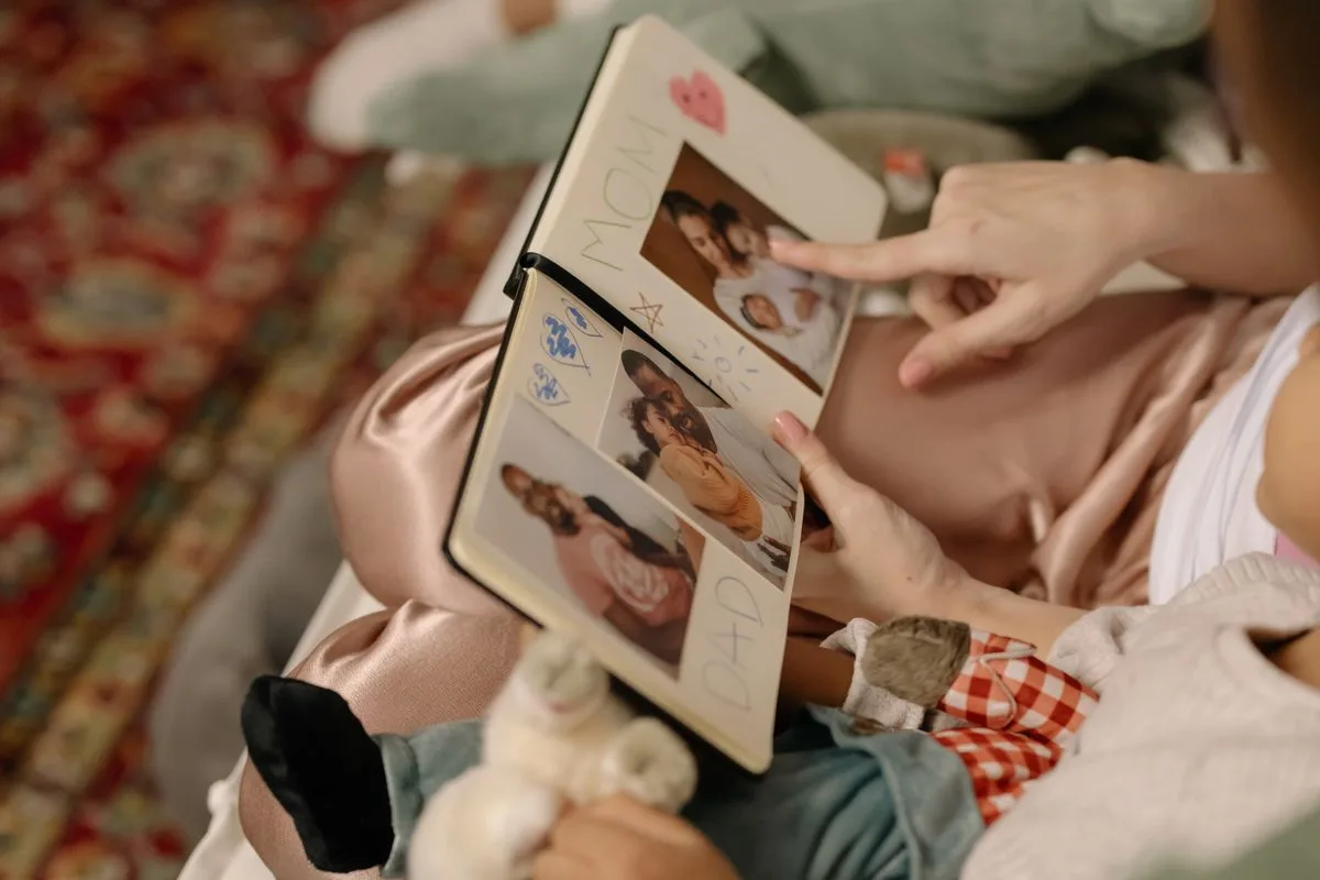 A scrapbook with a photo on the cover